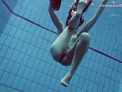Slender Raven-haired Stunner Undresses While Diving In The Pool Porn Videos